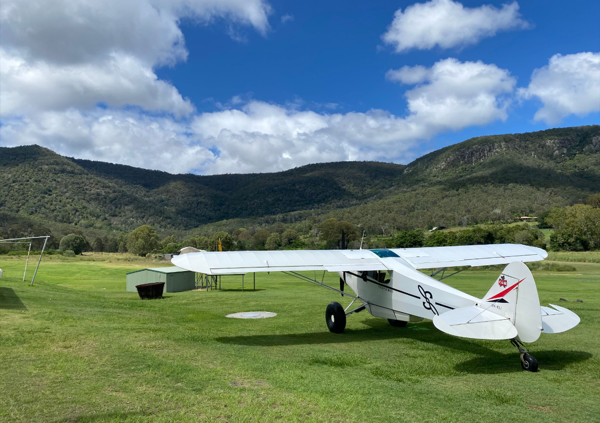 Tailwheel Endorsement Training training picture showing a tailwheel plane on a field. Learn about Tailwheel Flight Training